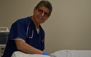 Dr. George with patient Michigan Rapid Drug Detox Center All Opiates Detox Facility
